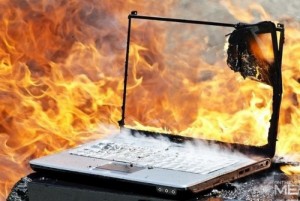 Create meme: Burning laptop