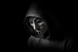 Создать мем: маска хакера, человек, темное изображение
