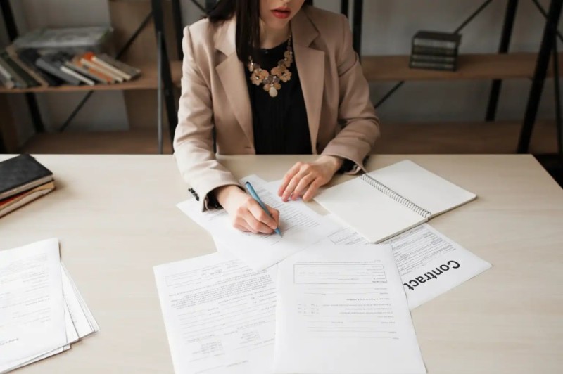 Create meme: The business woman signs, business woman, a contract with a woman