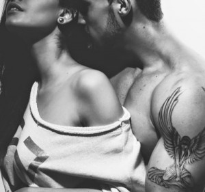 Create meme: photo of a beautiful couple passion love, photo embrace men and women kiss, tattooed couples pictures