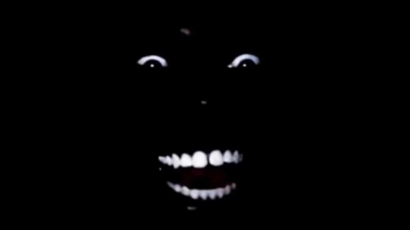 Create meme: a scary face in the dark, a black smile in the dark, a scary smile in the dark