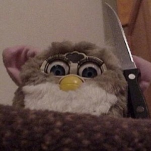 Создать мем: furby with knife, мем furby, смешное фото ферби