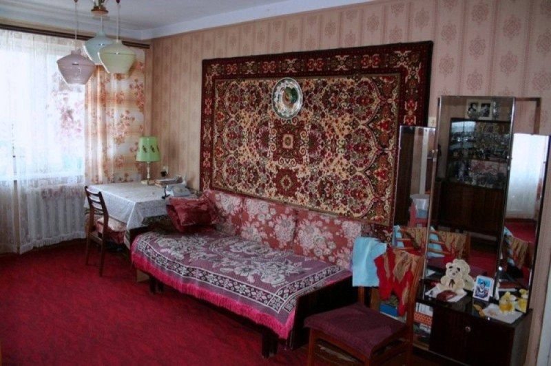 Create meme: the interior of an old apartment, soviet carpet on the wall, a room in the Soviet style