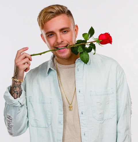 Create meme: The Bachelor Egor Creed show, Creed with a rose in his mouth, egor creed with a bouquet