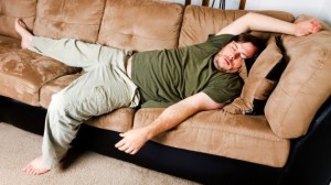 Create meme: man sleeping on sofa, a man lies on the sofa photo, man sleeping on sofa