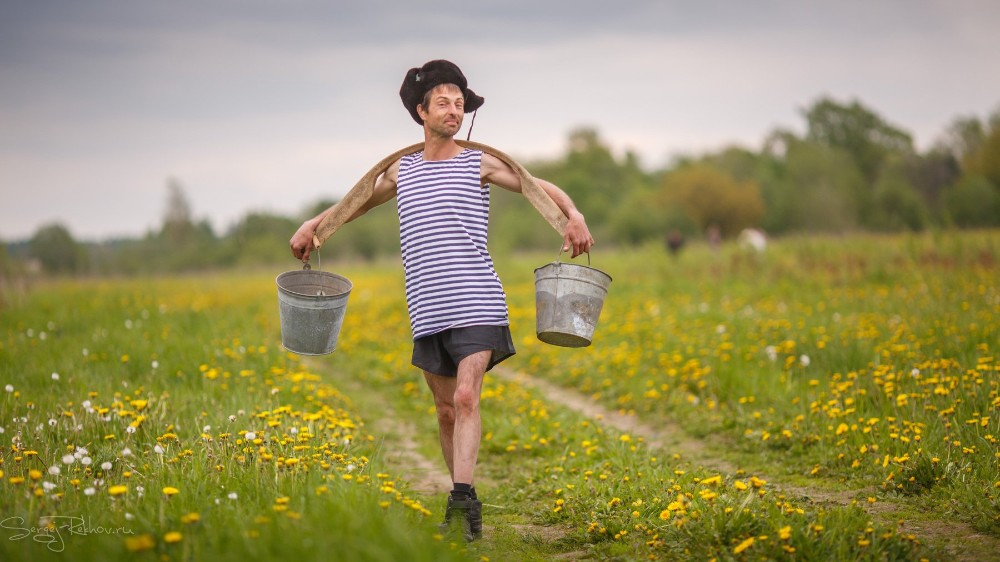 Create meme: The man with the bucket, the first guy in the village , people