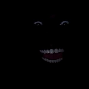 Create meme: dark, Negro in the dark, Negro in the dark with white teeth