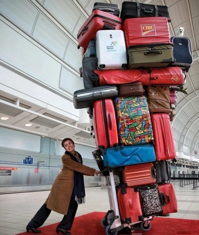 Create meme: a huge suitcase, There are a lot of suitcases, The man with the big suitcases