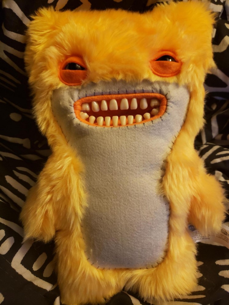 stuffed monster with teeth