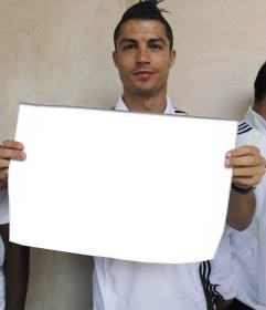 Create meme: Ronaldo , Cristiano Ronaldo with a sign, Ronaldo holds a piece of paper