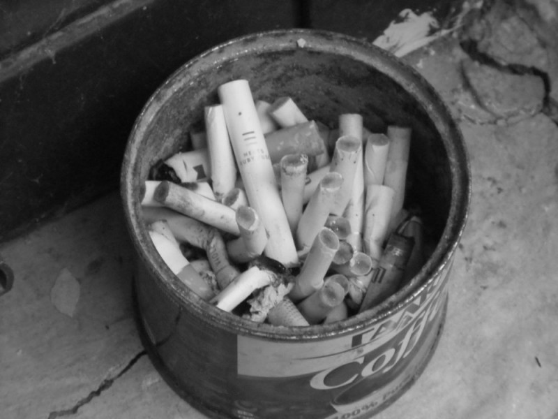 Create meme: a jar of cigarette butts, cigarette butts, cigarettes'