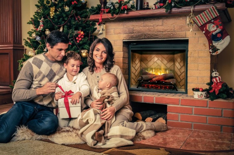 Create meme: family photo shoots near the fireplace for the new year, family by the fireplace, New Year's photo shoot for a family in a house with a fireplace